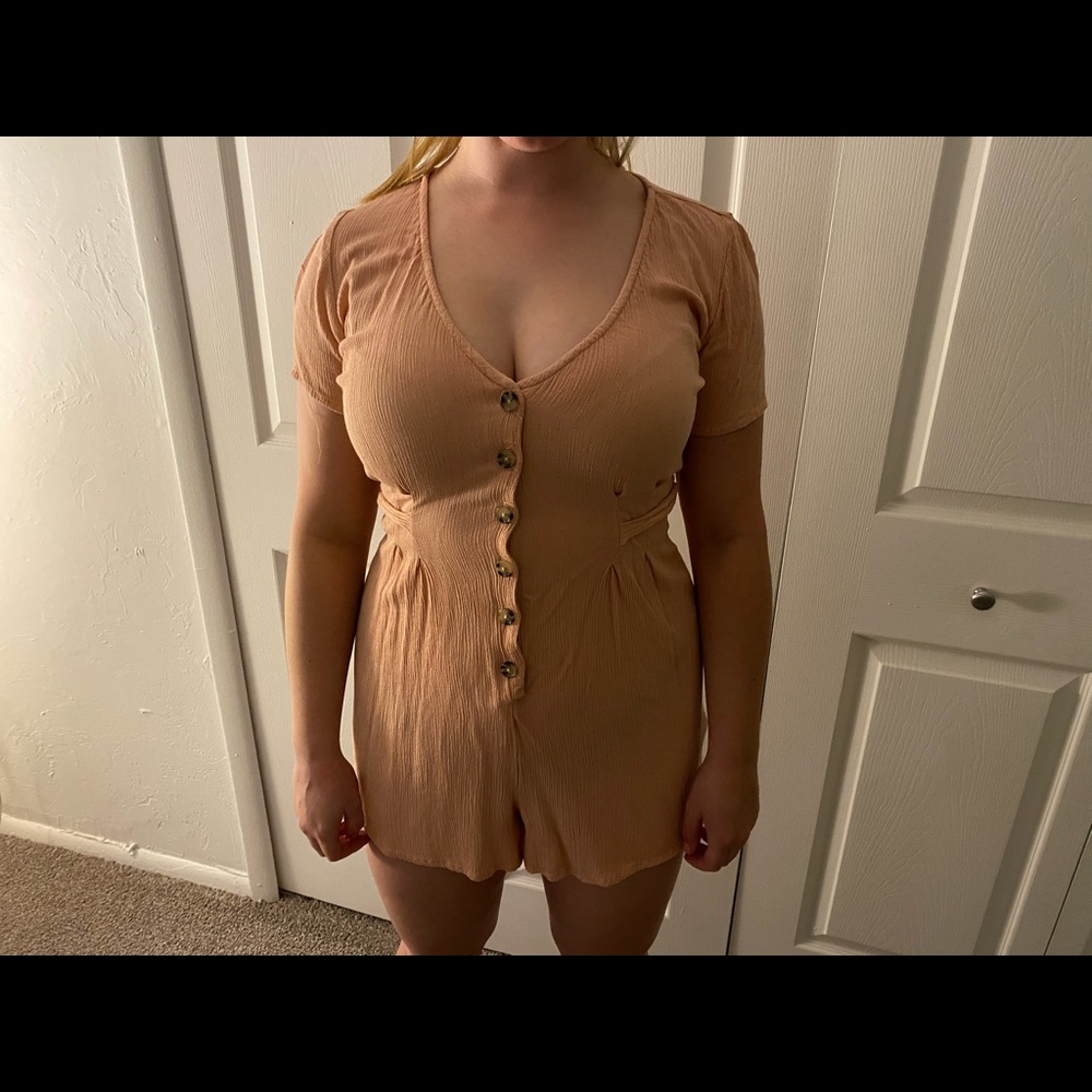 Pink button up romper